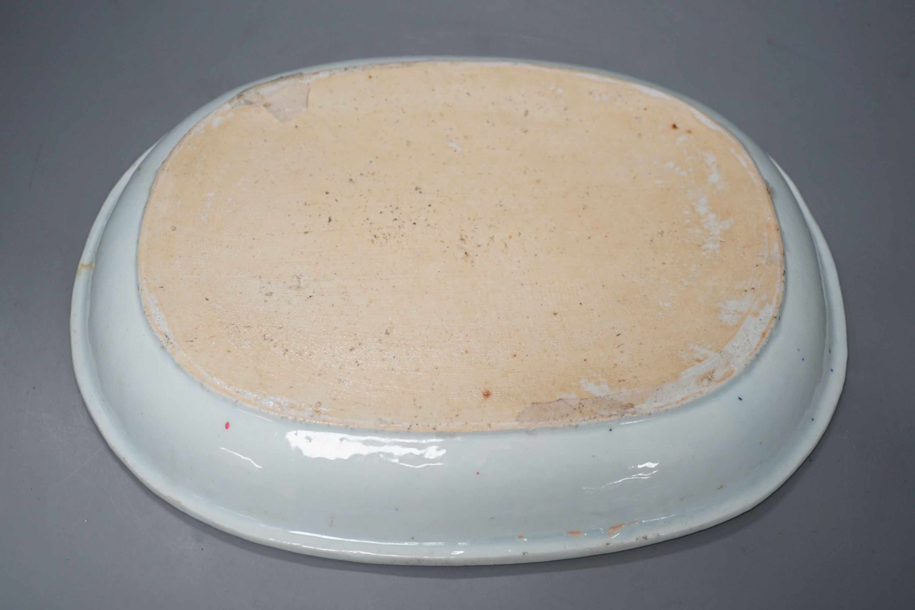 An 18th century Chinese export oval blue and white dish, 32cm.